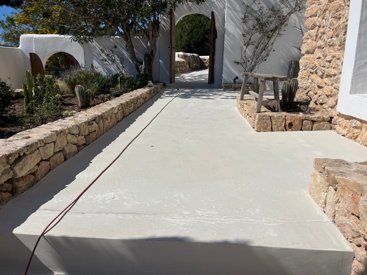 Smooth polished exterior walkway at a finca