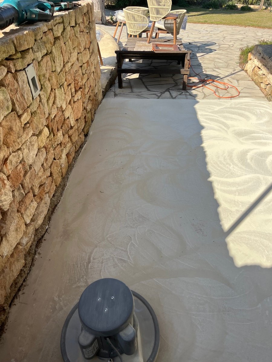 Professional orbital machine polishing an exterior walkway